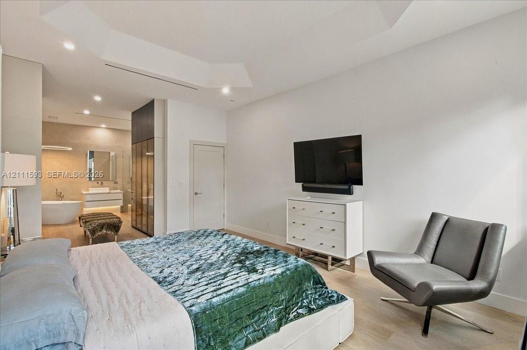 Large master bedroom with sitting area