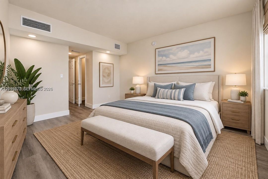Neutral-toned interior featuring wood-finish flooring, recessed lighting, and a neutral color palette