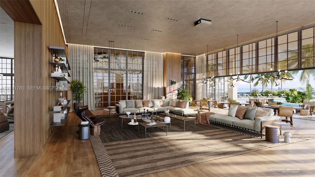 Expansive living area featuring floor-to-ceiling multi-panel windows, wood-finish wall paneling, recessed lighting, integrated shelving, and wood-finish flooring