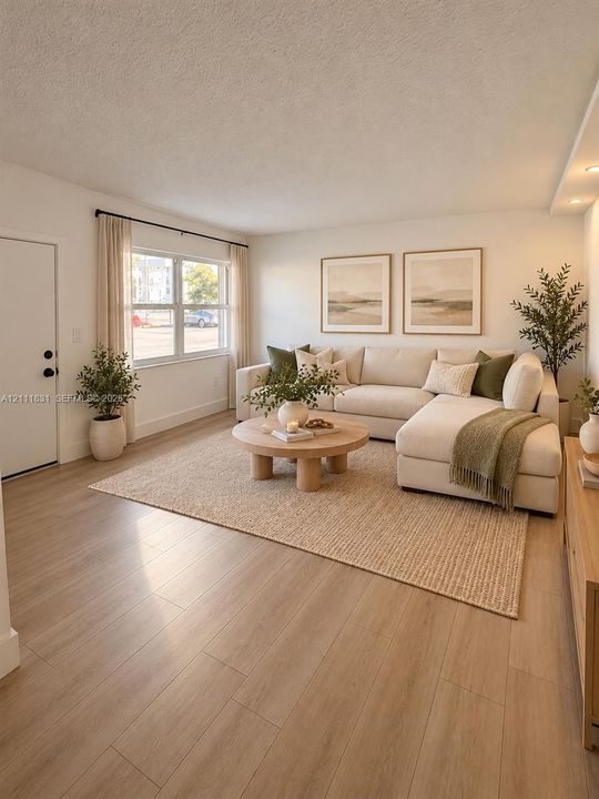 Living area featuring light-toned wood-finish flooring, dual-pane windows, and recessed lighting