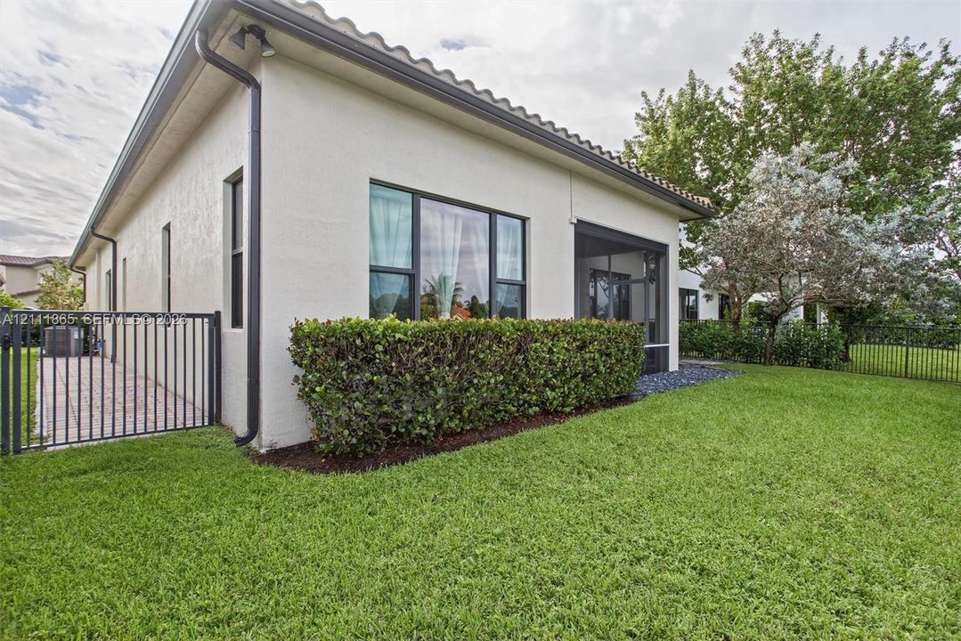 Nicely manicured rear view of home