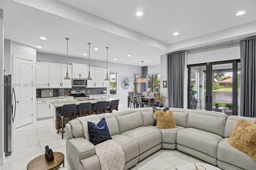 View of open concept living space - Living, dining, kitchen.