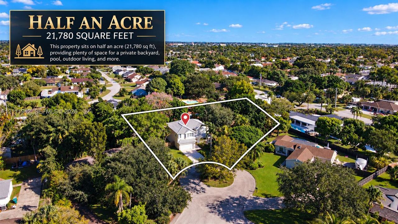 Half-acre parcel featuring mature trees, a multi-story residence, and a paved driveway