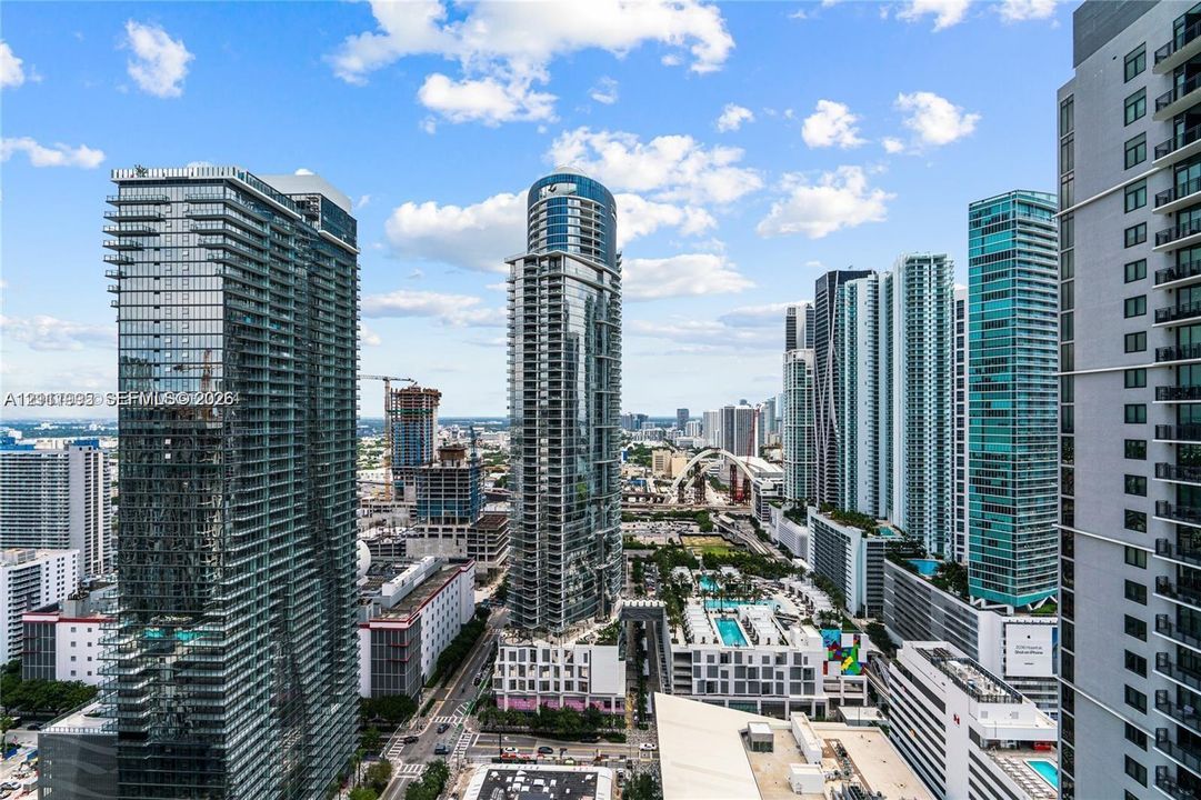 High-rise urban landscape featuring contemporary glass-clad skyscrapers, expansive skyline orientation, and structured metropolitan density