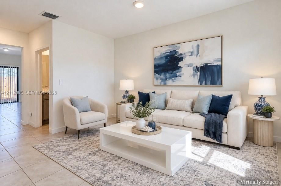 Neutral-toned tile flooring and neutral wall paint
