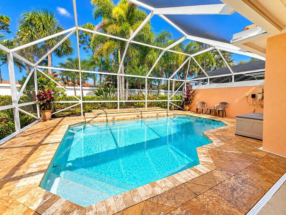 Sunlit Tropical Pool Lanai