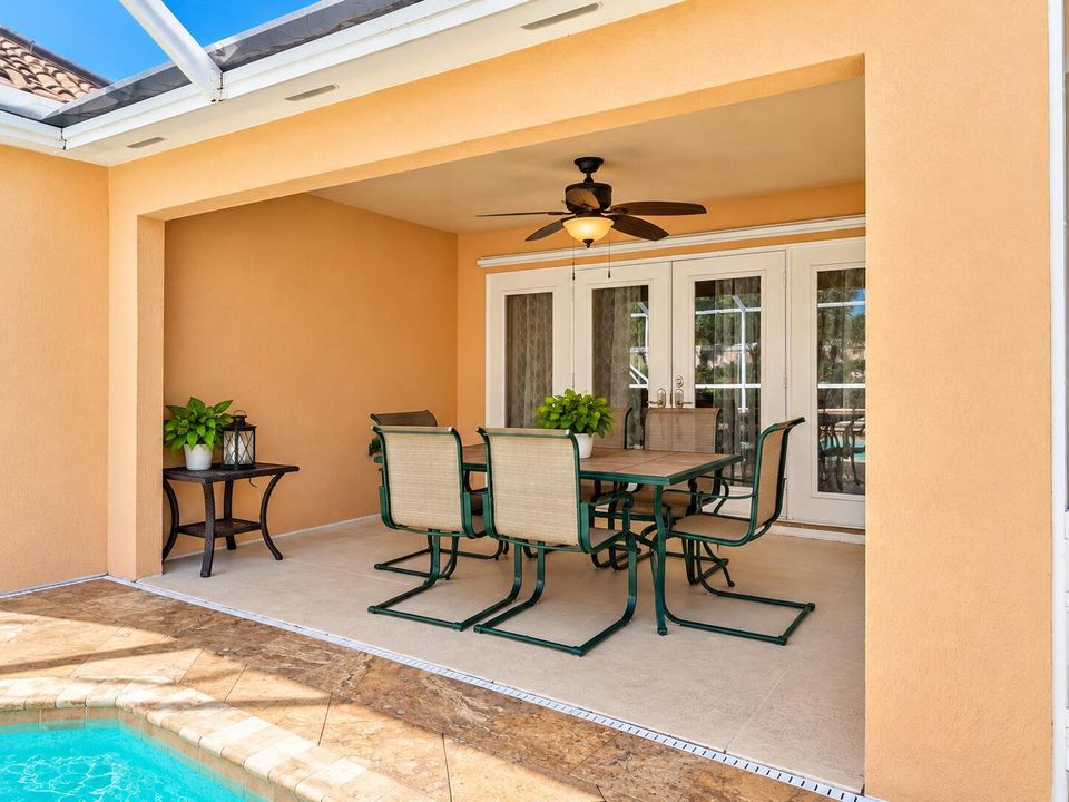 Sunlit Patio Dining by the Pool