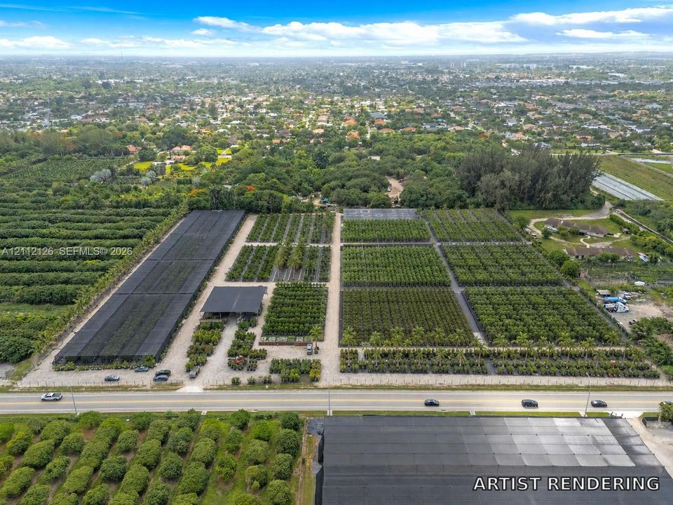 Expansive agricultural acreage featuring organized planting rows, protective shade structures, a central open-air covered pavilion, and gravel access paths