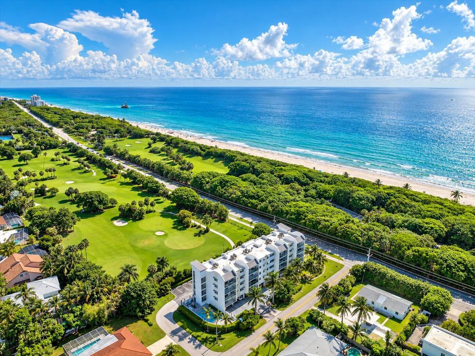 Sunlit Aerial Coastal Resortscape