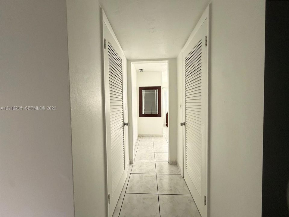 Hallway leading to walking closet and master bedroom