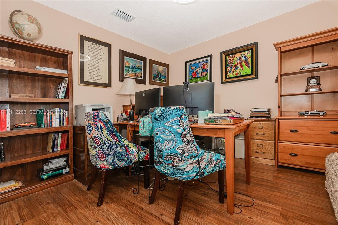Room featuring wood-finish flooring