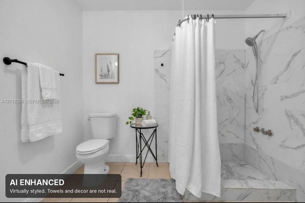 Virtually staged (AI). Furniture and decor are not real. The unaltered original is the previous photo.