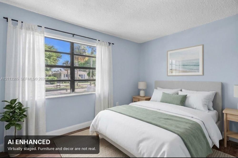 Virtually staged (AI). Furniture and decor are not real. The unaltered original is the previous photo.
