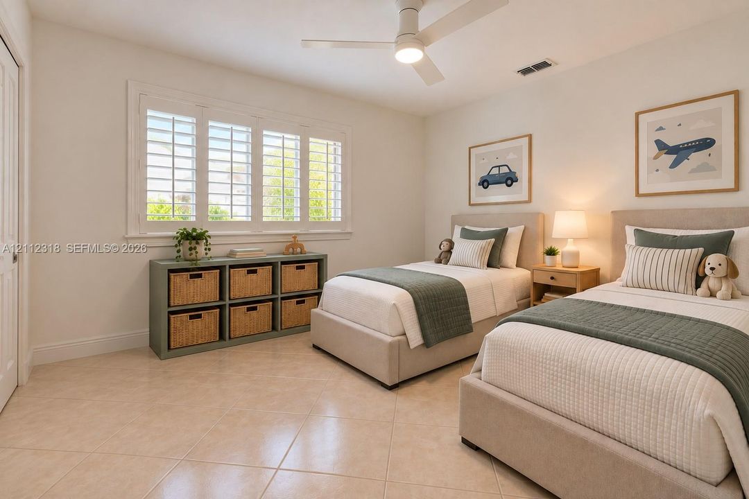 Bedroom featuring neutral-toned tile flooring, white plantation shutters, and a central ceiling fan with integrated lighting