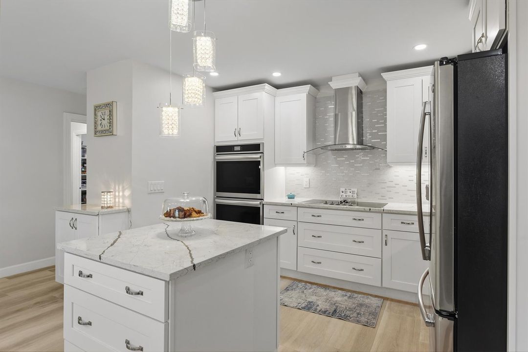 Chef's Kitchen with Elegant Lighting