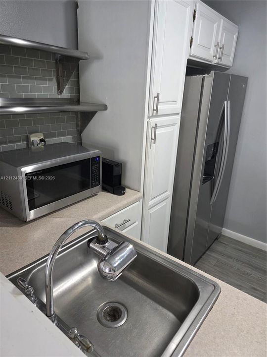 SS SHELVING, REF., RANGE, SINK, MICROWAVE