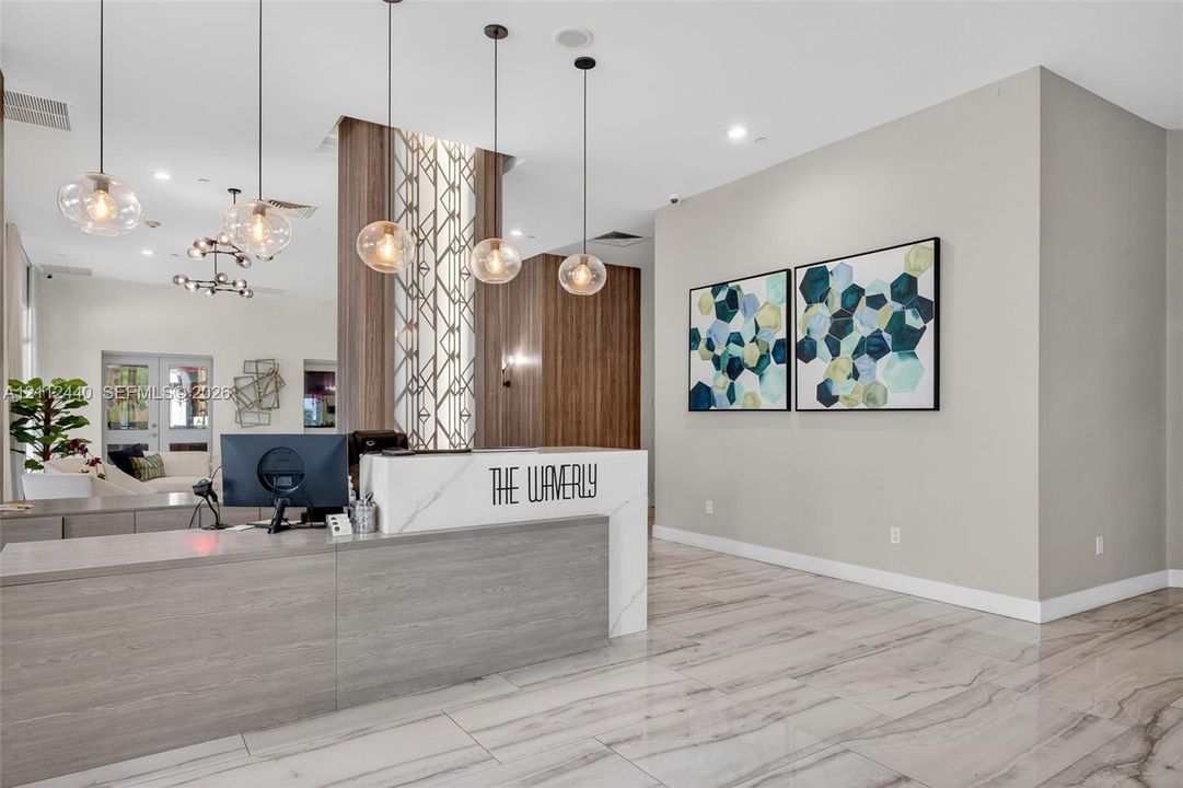 Reception area featuring sleek upgraded lobby finishes