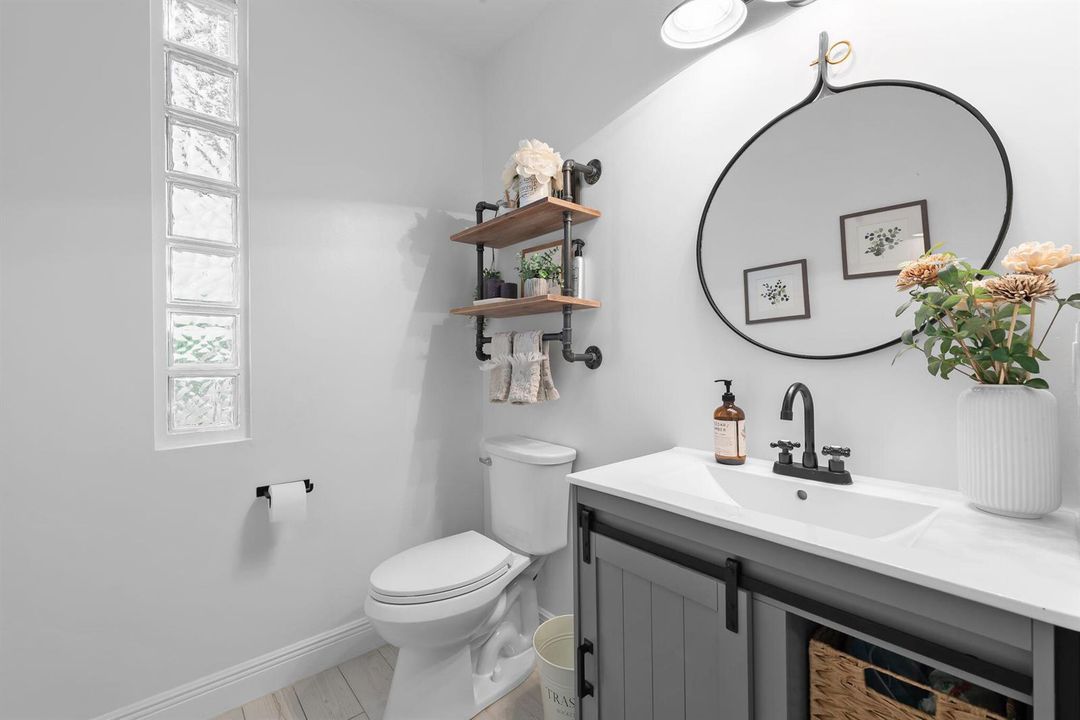 Half bathroom across from dry bar