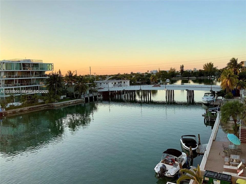 Waterfront location featuring a private boat slip, dock infrastructure, and direct water access