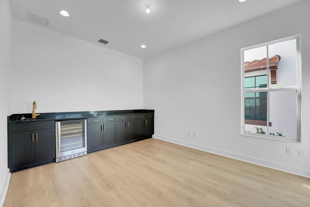 Den w/ Wet Bar and beverage frig