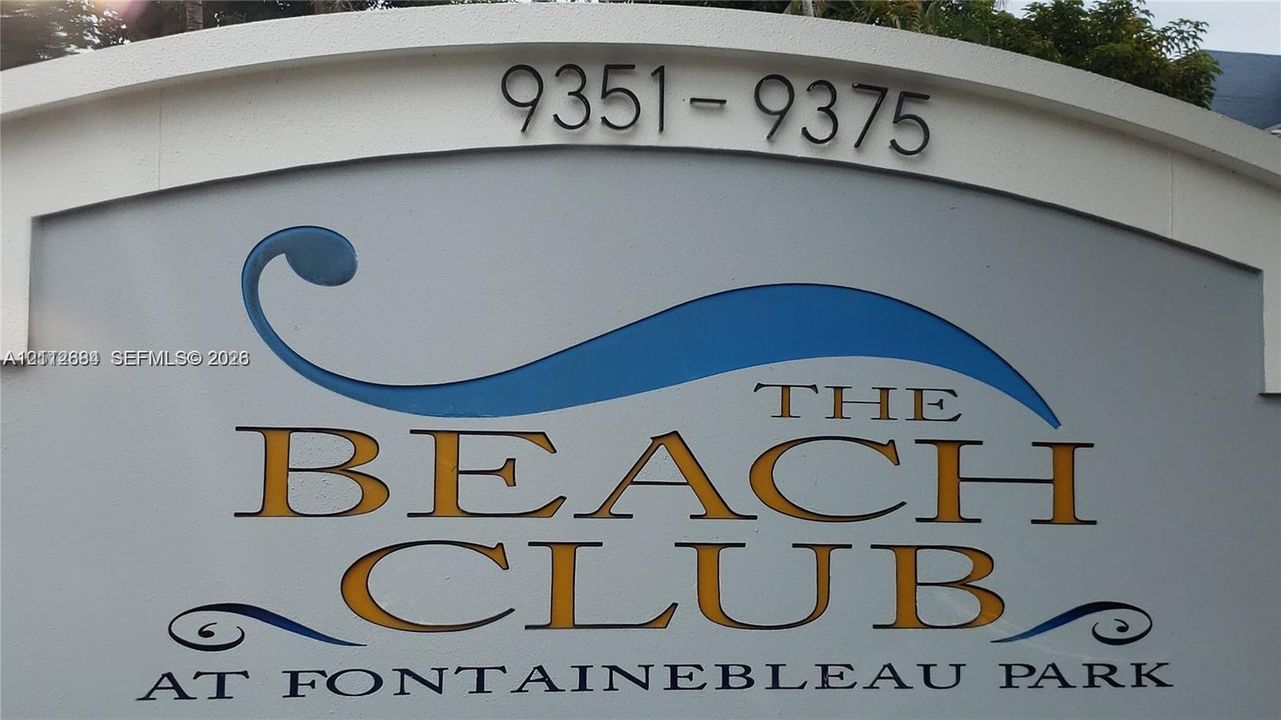 Custom architectural monument signage for The Beach Club at Fontainebleau Park featuring dimensional lettering and an arched header