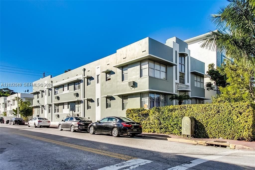 Art Deco architectural exterior featuring geometric detailing, multi-pane windows, and a structured masonry façade