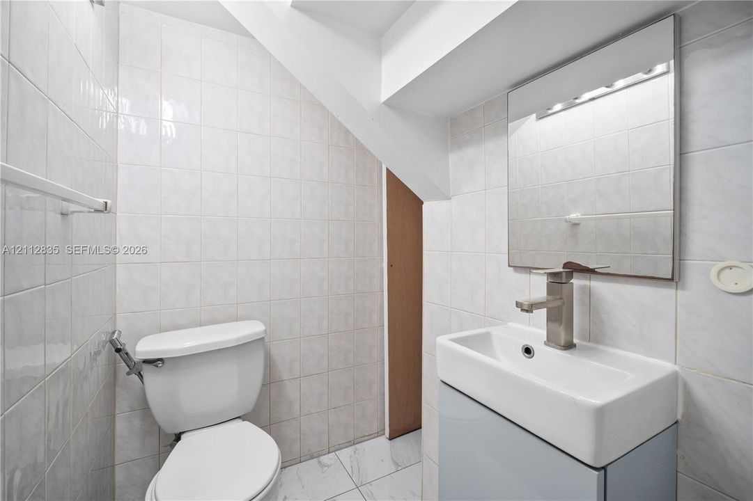 An additional half bathroom adds convenience