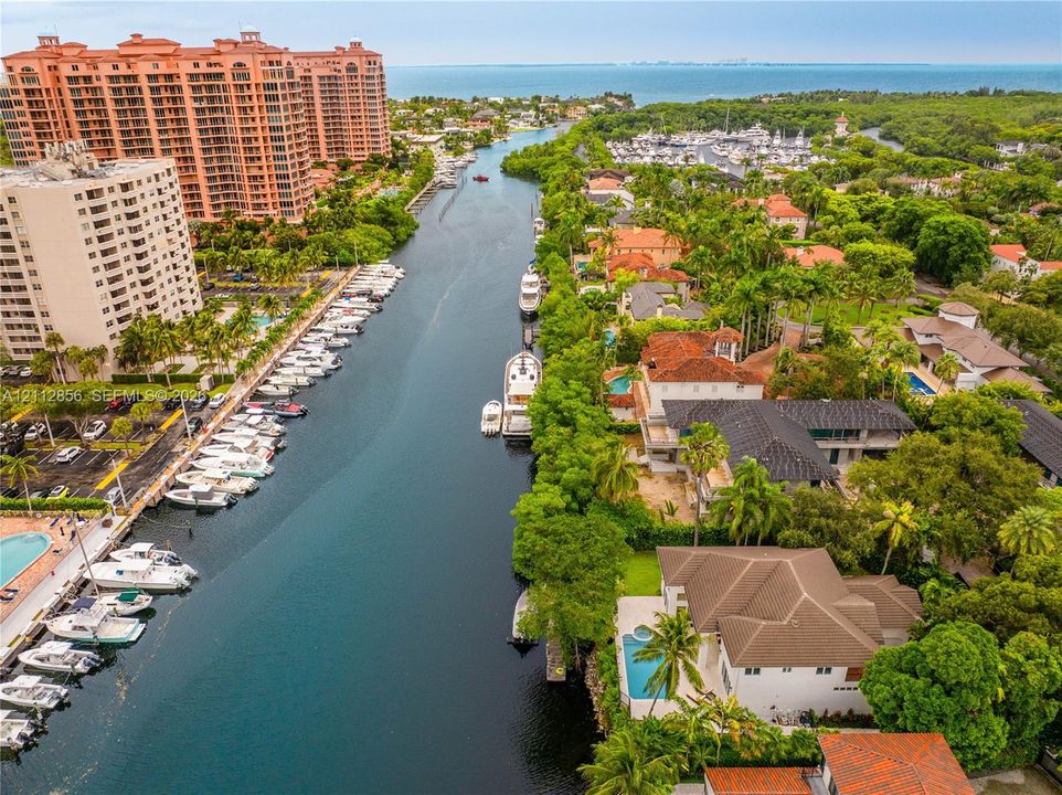 Waterfront property featuring a private swimming pool, deep-water canal access, and proximity/no bridges  to open bay waters