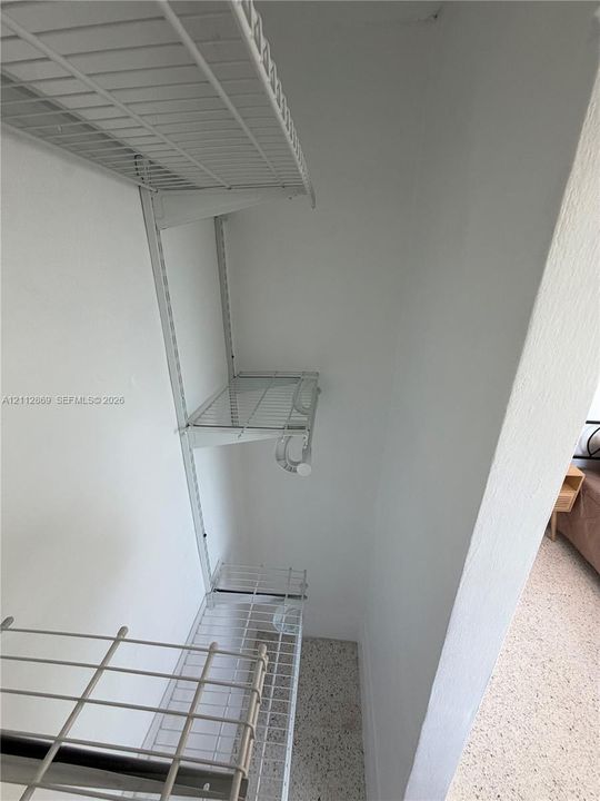 Built-in white wire shelving system