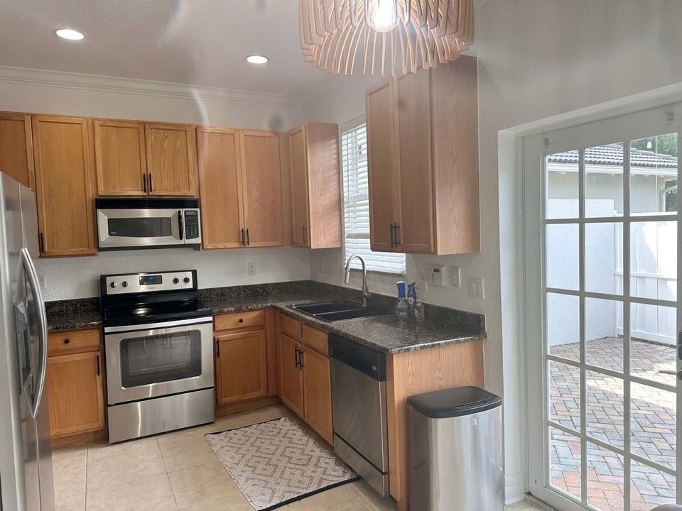 KITCHEN WITH VIEW OF COURT YARD
