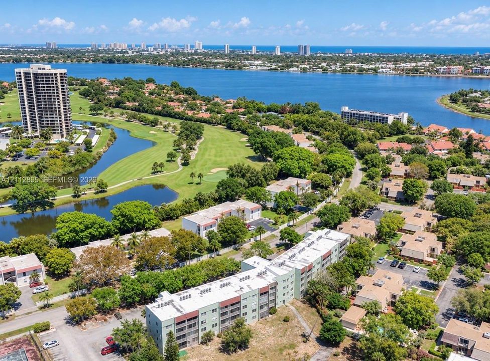 Aerial perspective exposure, proximity to a golf course, and surrounding lush mature landscaping