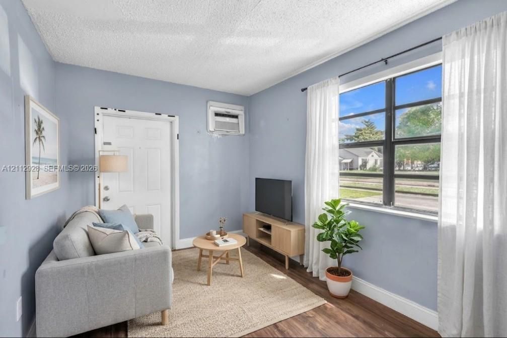 Virtually staged (AI). Furniture and decor are not real. The unaltered original is the previous photo.