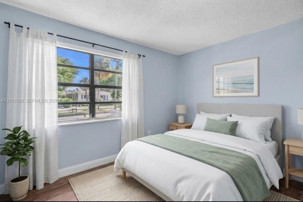 Virtually staged (AI). Furniture and decor are not real. The unaltered original is the previous photo.