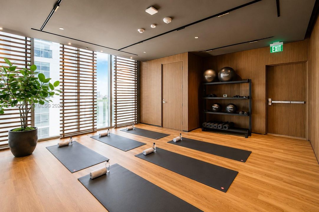 Wood-finish flooring, floor-to-ceiling windows with horizontal louvered blinds, and wood-paneled walls
