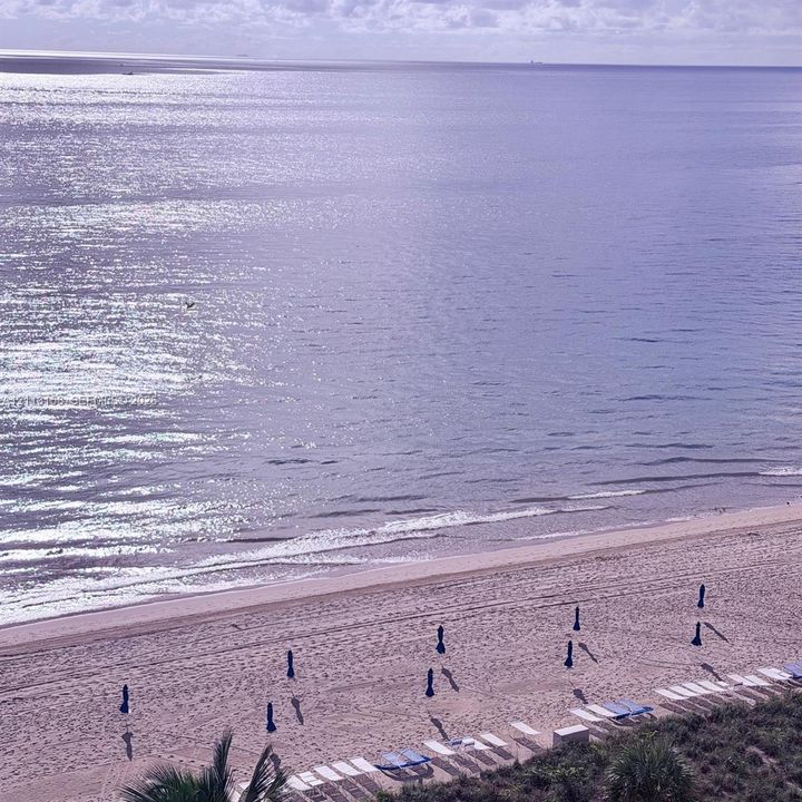 Direct oceanfront exposure featuring expansive sandy beach access