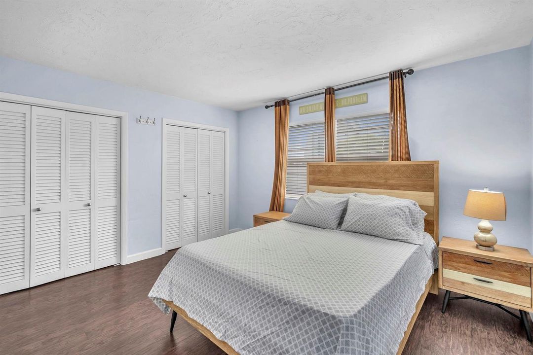 Bedroom with his/her closets