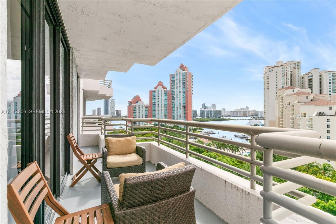 Covered oversized balcony featuring expansive ocean, cityscape and intracoastal views