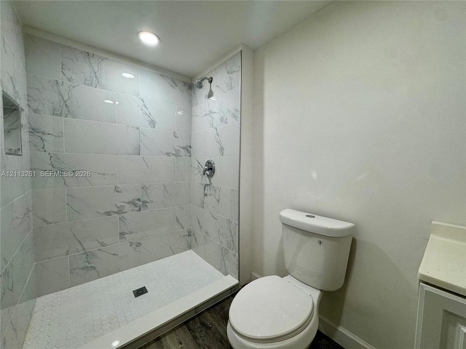 Bathroom of Bonus bedroom in the upstairs section of garage.