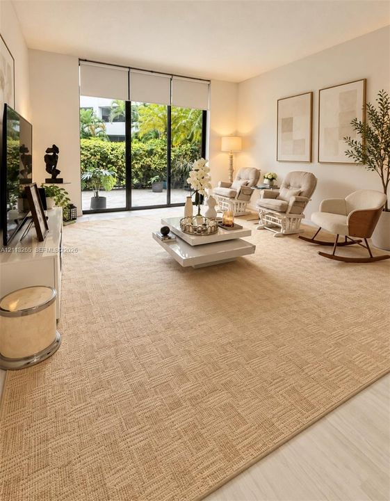 Full-height sliding glass doors featuring black frames, integrated roller shades, and direct access to an exterior paved patio area