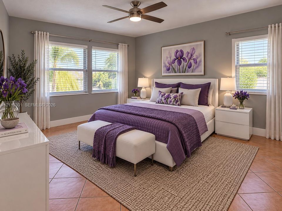 Ceramic tile flooring, multiple double-pane windows, and a ceiling fan with integrated light fixture