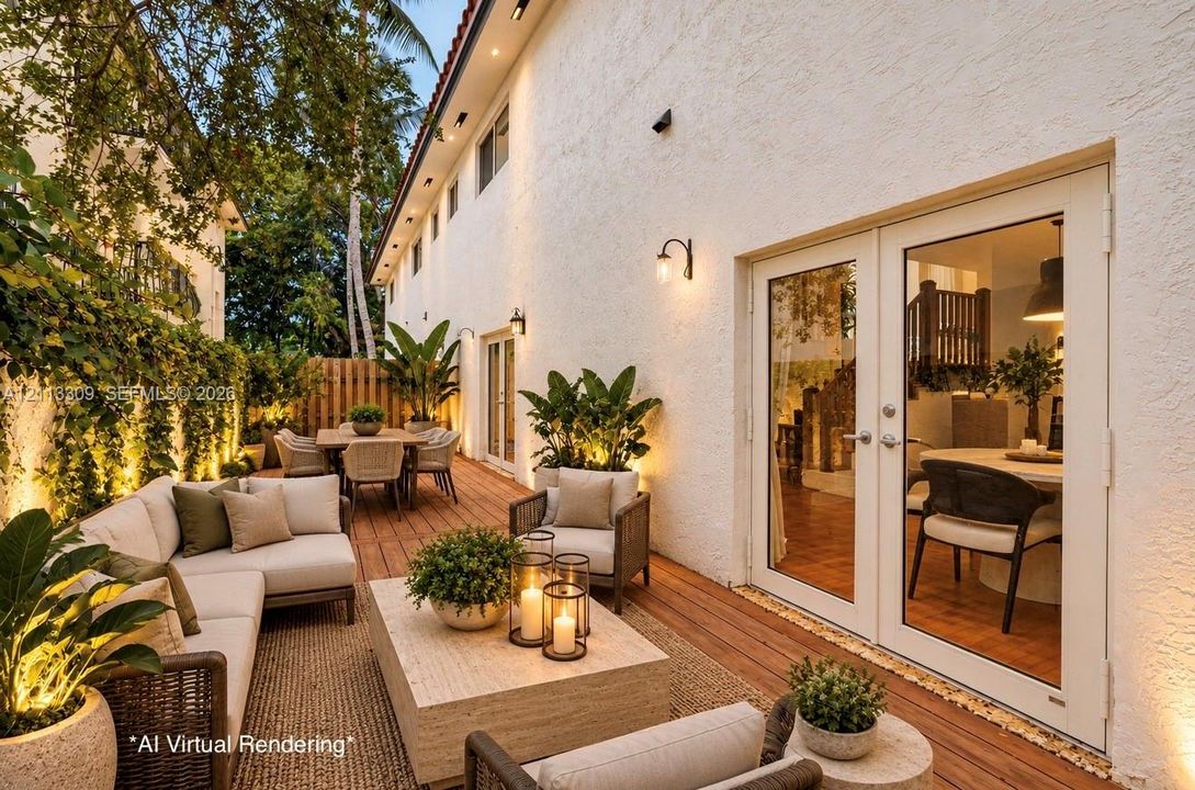 Exterior deck featuring wood-finish decking, smooth-finish stucco wall, and dual glass-panel patio doors