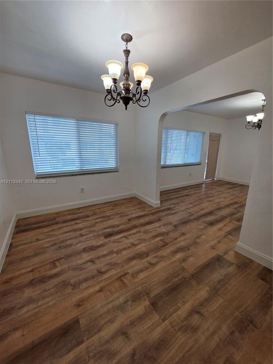 Multi-light chandelier, and arched doorway