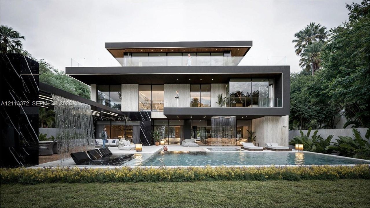 Modern multi-level exterior featuring floor-to-ceiling glass paneling, stone facade cladding, cantilevered rooflines, integrated waterfall features, and an inground swimming pool with a stone deck