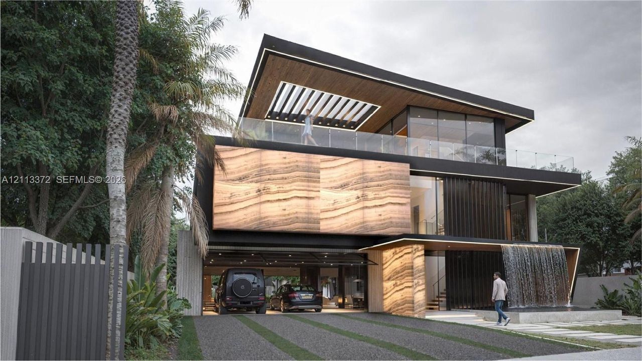 Modern architectural exterior featuring a tiered roofline, stone-paneled facade, integrated water feature, glass-railed balconies, and a covered ground-level parking area