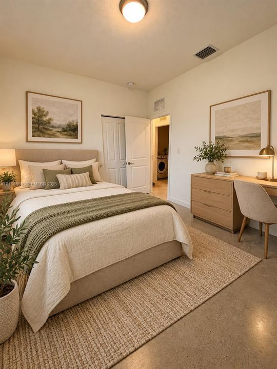 Polished concrete flooring, neutral wall tones, and recessed ceiling lighting