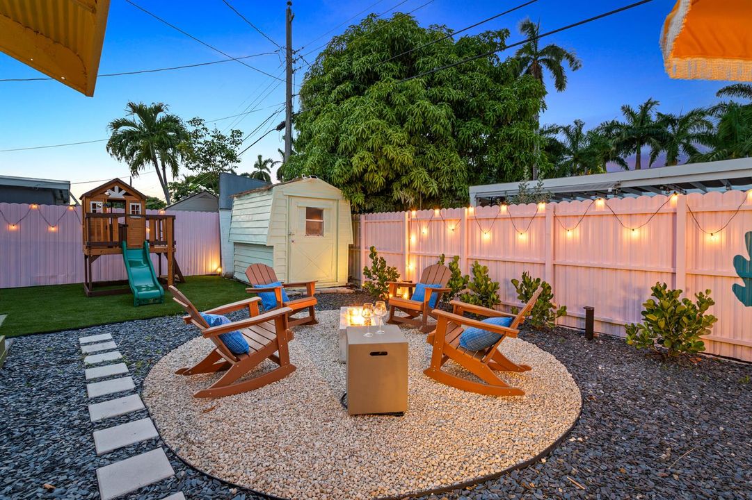 Hallandale Sunshine - Firepit at night