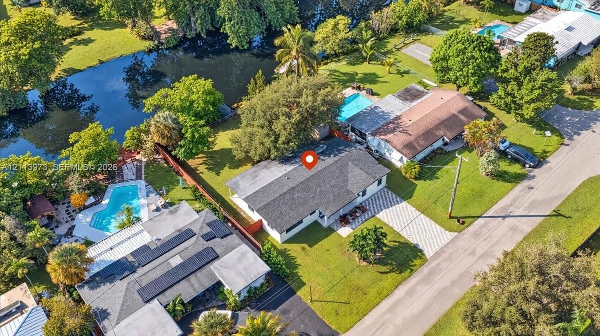 Freedom in your land.  driveway, expansive lawn, and direct waterfront access
