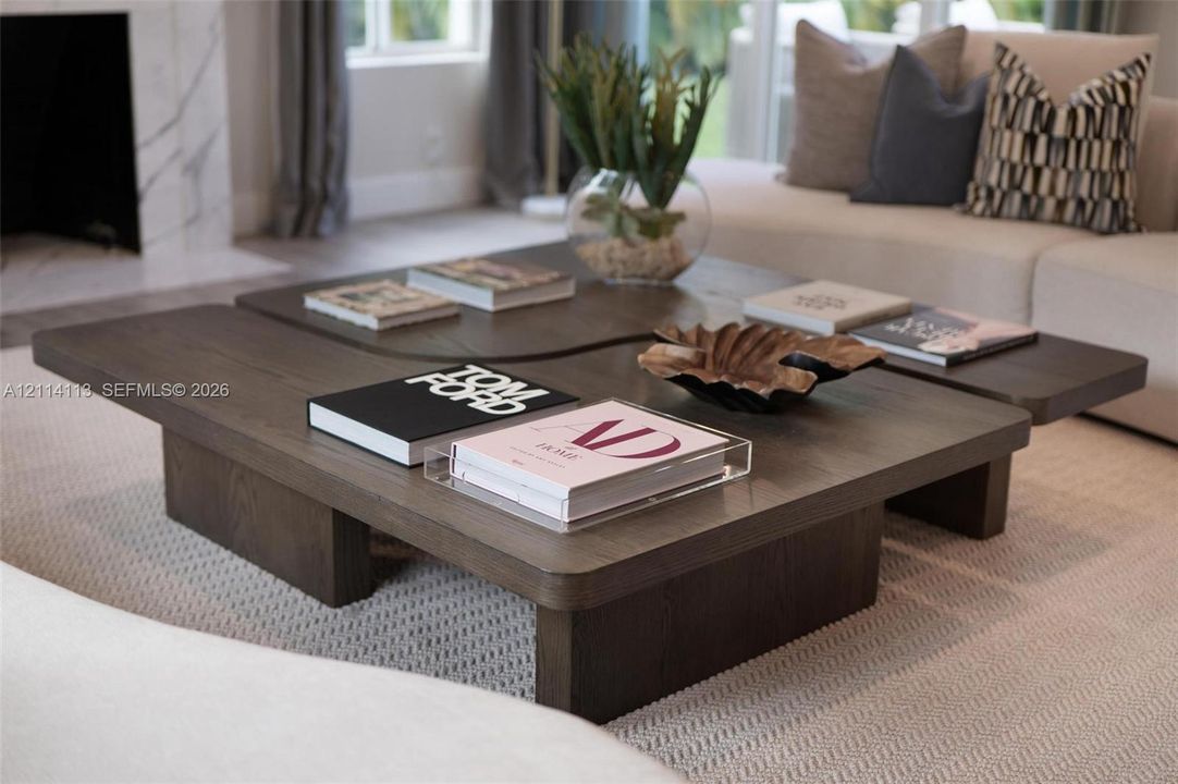 Fireplace with stone-finish surround and wood-finish flooring