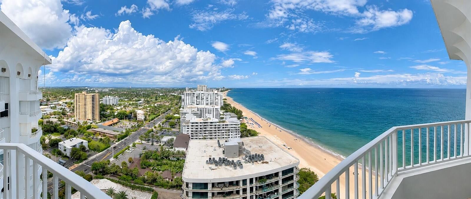 Panoramic Coastal City Balcony View