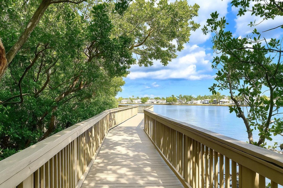 Wooden Boardwalk on Tranquil Waters